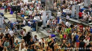 peak busy airport crowded crowd security checkpoint TSA Phoenix